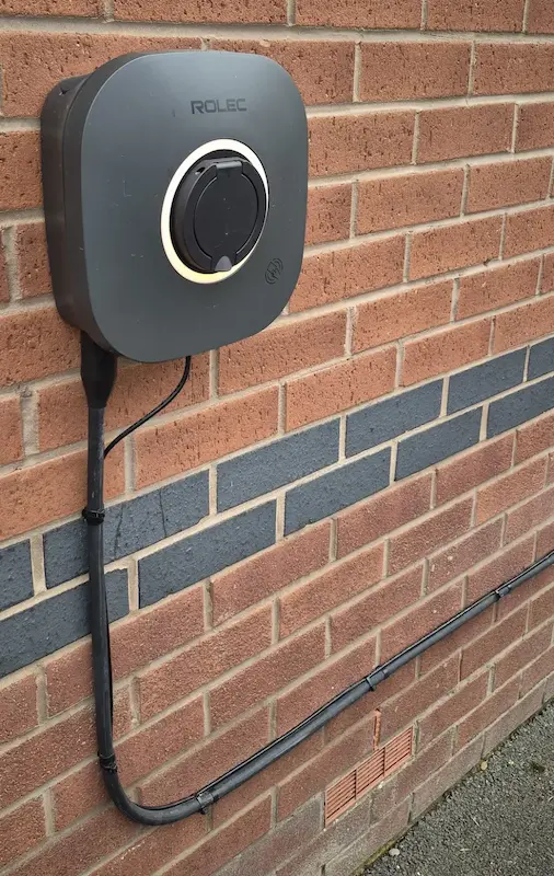Rolec EV charger installation with external cable run Rolec EV charger installation in Banbury with cable routed along external wall
