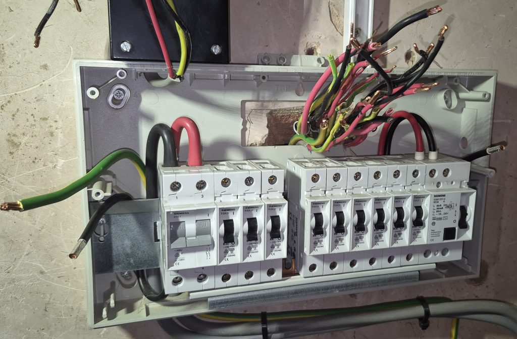 Consumer unit replacement work in progress during electrical upgrade in Banbury