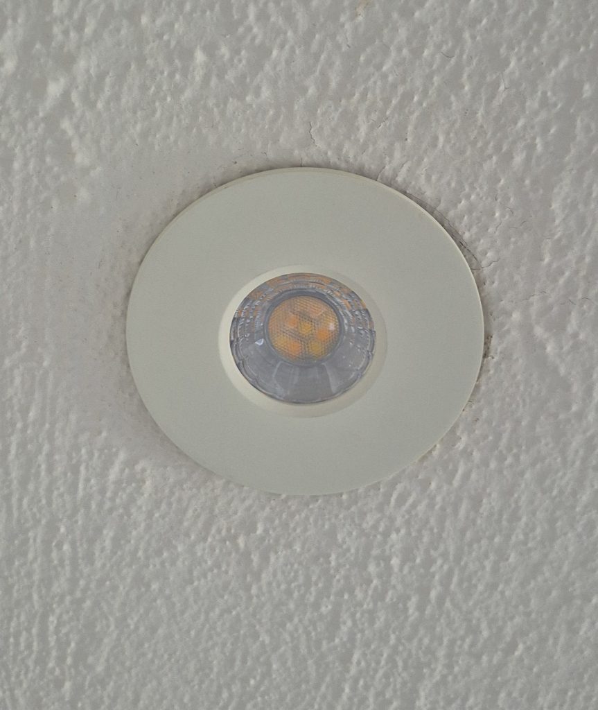 Installed LED downlight in ceiling, bathroom recessed lighting