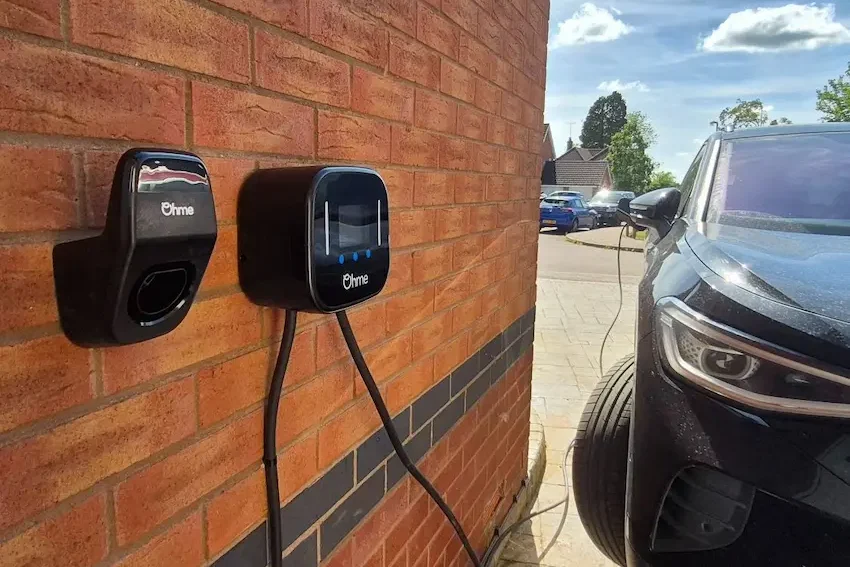 Ohme EV charger installed and charging Volkswagen ID4 electric vehicle at a home in Adderbury