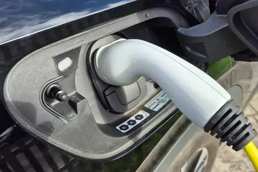 Electric car charging during an EV charger installation by RW Currion Electrical in Banbury