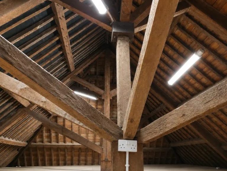 Loft Lighting and Power Installation near Banbury Loft lighting and power installation showing LED batten lights, twin socket and conduit in a large boarded loft space near Banbury.