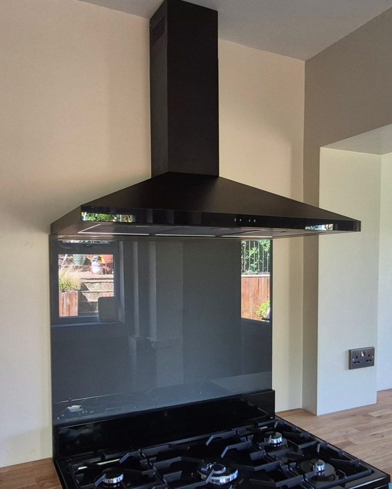 Kitchen Extractor Hood Installation Adderbury Black kitchen extractor hood installed above a range cooker in an Adderbury home.