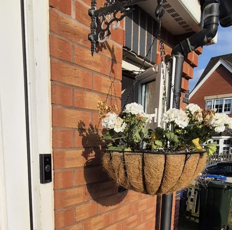 Smart doorbell installed beside a front door in Banbury