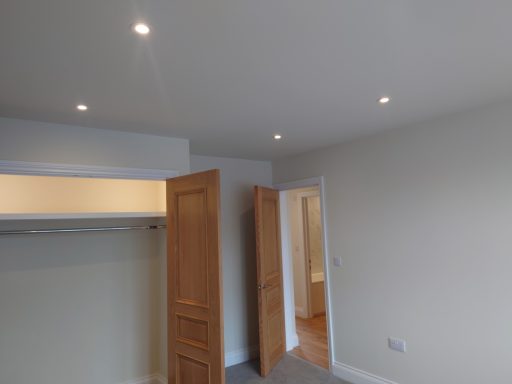 Second fixed lights and sockets in a bedroom.