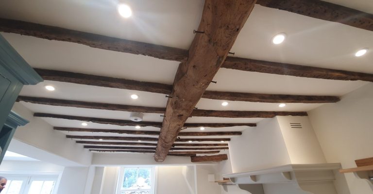 LED Downlights Installed in Banbury Property LED downlights installed between exposed timber beams in a Banbury property by RW Currion Electrical.