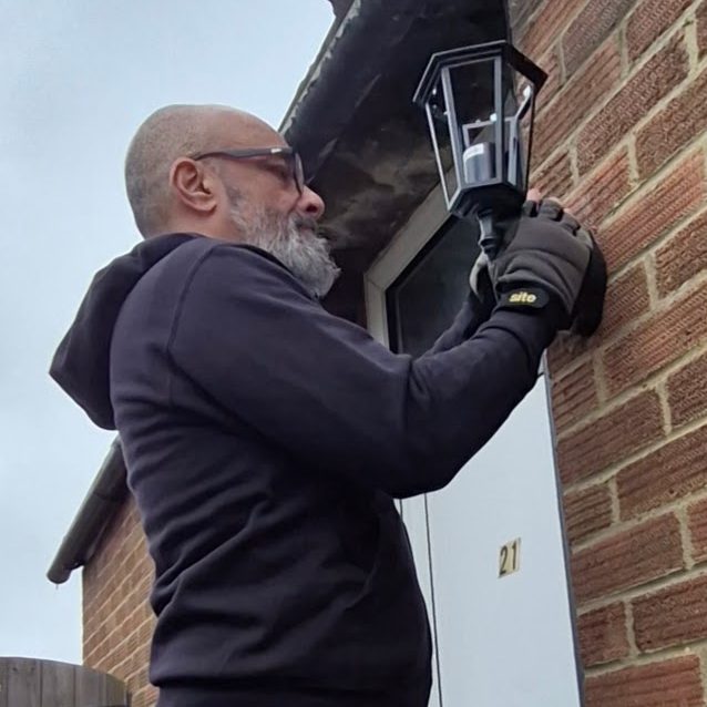 Richard replacing security lights in Banbury
