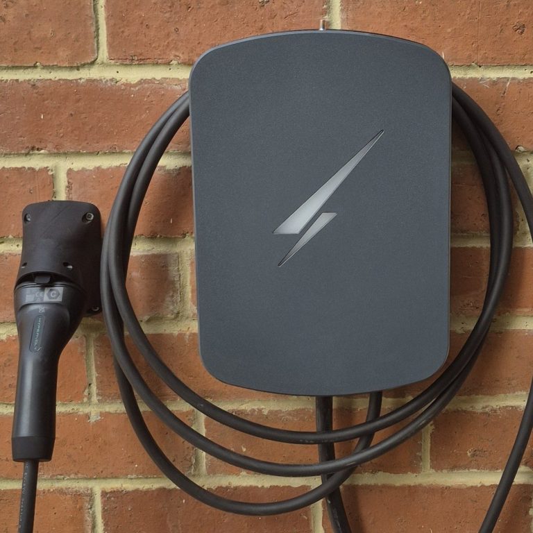 EV charger installed on exterior wall of home in Banbury