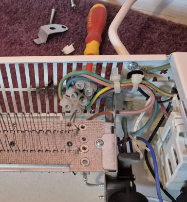 Damaged heater with unsafe DIY electrical connections identified and repaired.